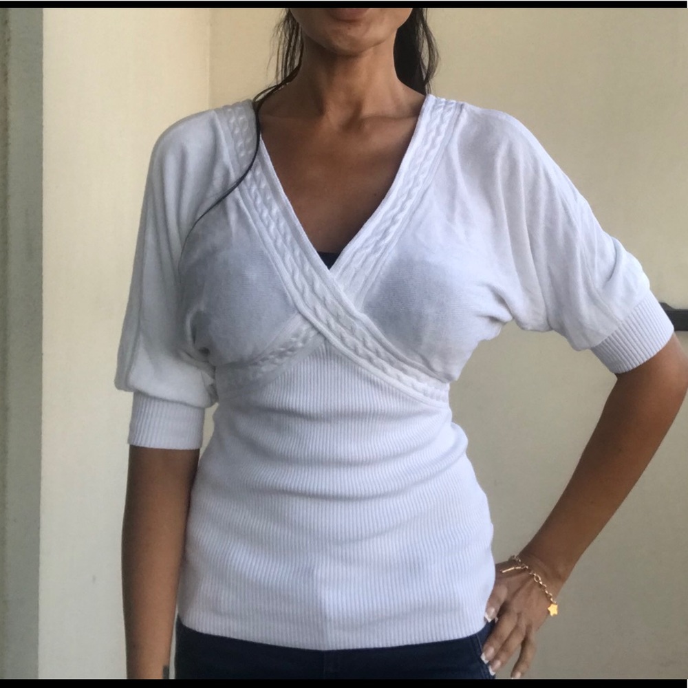 Bebe fitted sweater top slightly worn